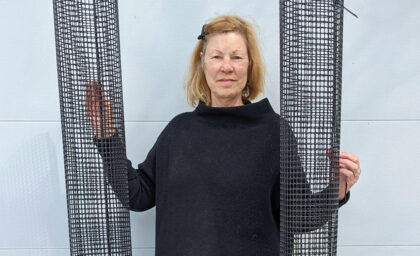 a woman with two tree guards